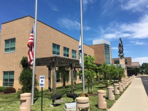 Flags outside the Mayerson JCC fly at half staff to honor victims of the attack in Orlando.